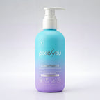 PixieYou Conditioner in a gradient blue and purple bottle, featuring a pump dispenser. 8.5 fl oz, enriched with coconut and s