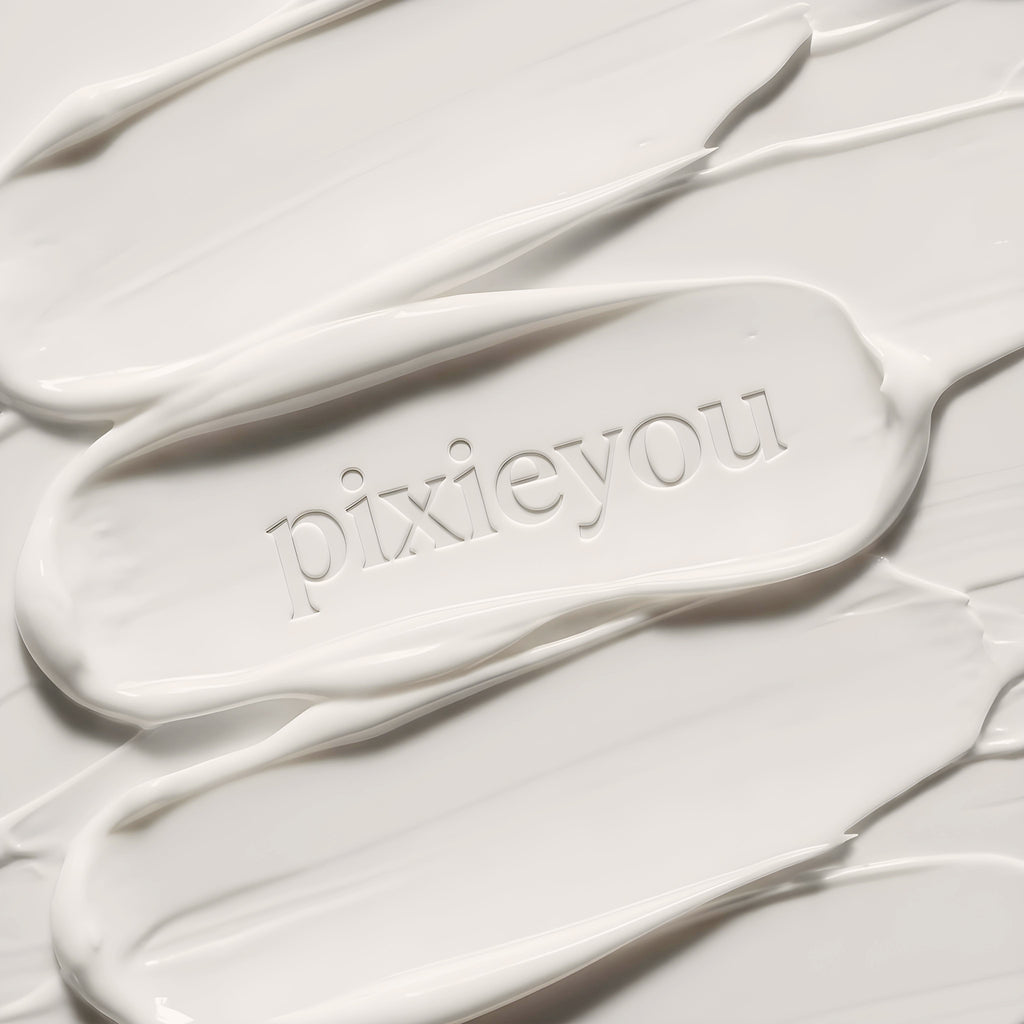PixieYou Leave-in product displayed on a smooth, creamy white background with the brand name embossed.